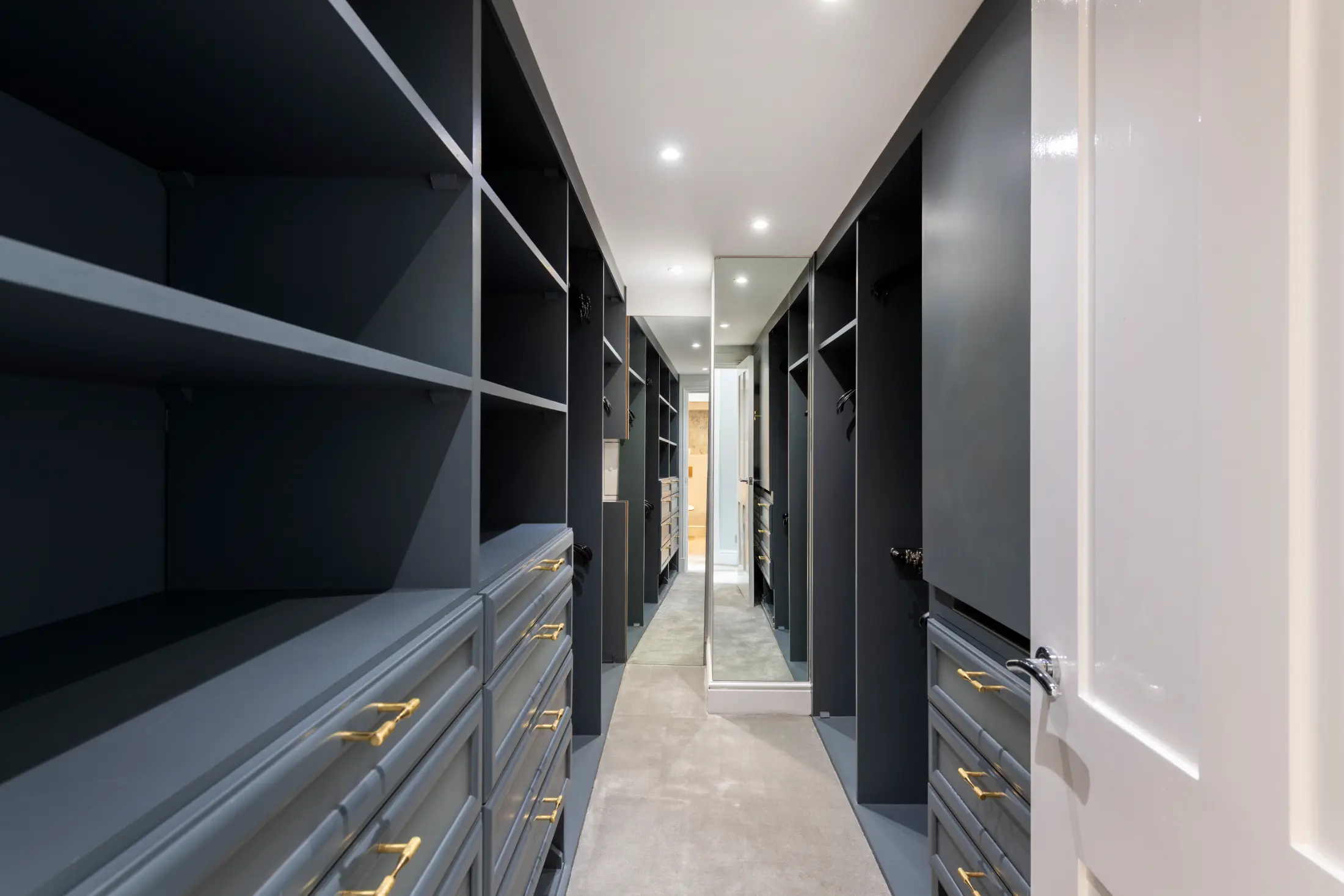 Spacious dressing room at Casa Cribs with ample storage and refined style.