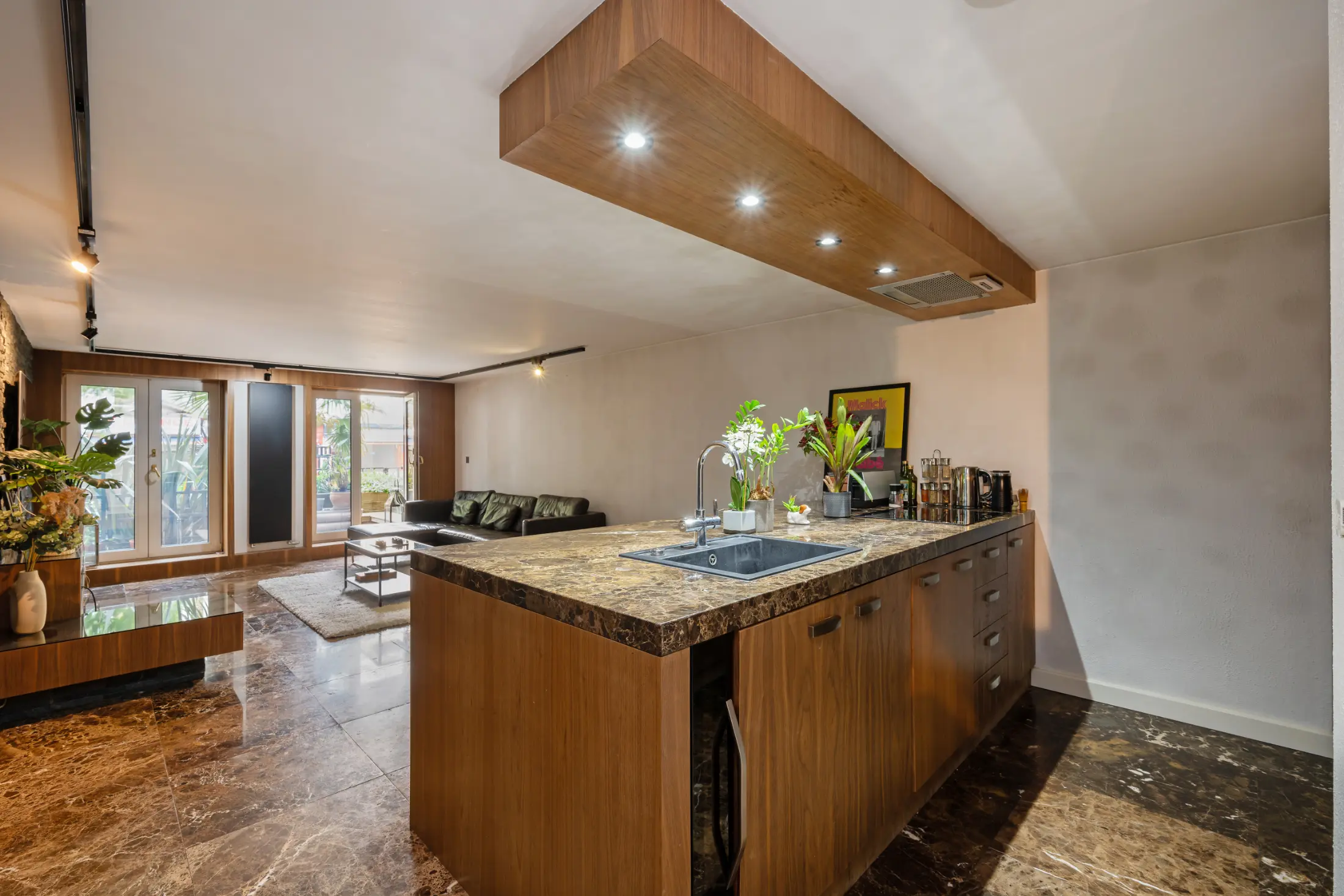 Fully equipped kitchen at Casa Cribs with modern appliances and a sleek layout.
