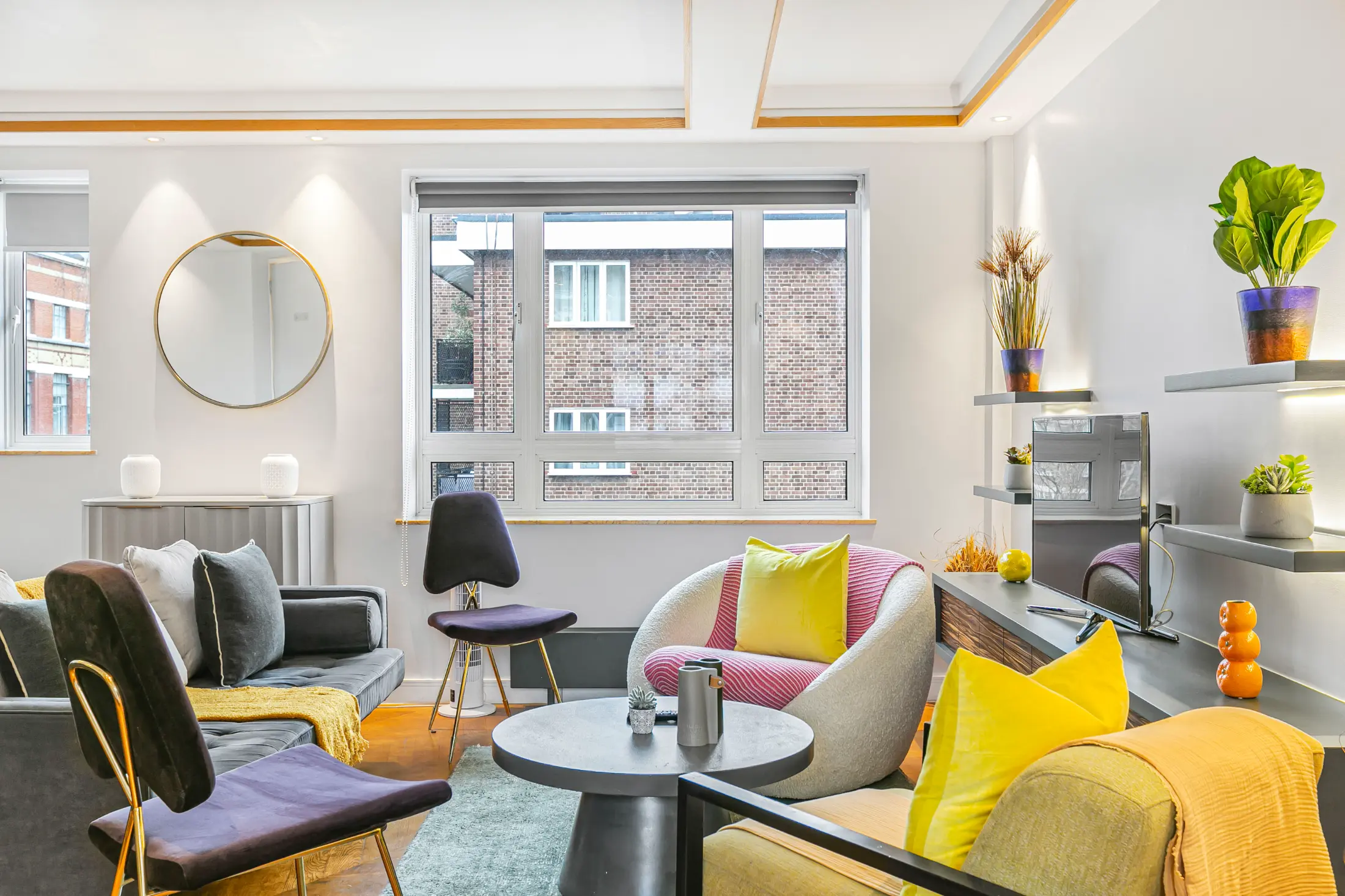 Fourth perspective of the stylish living space at Casa Cribs with contemporary touches.