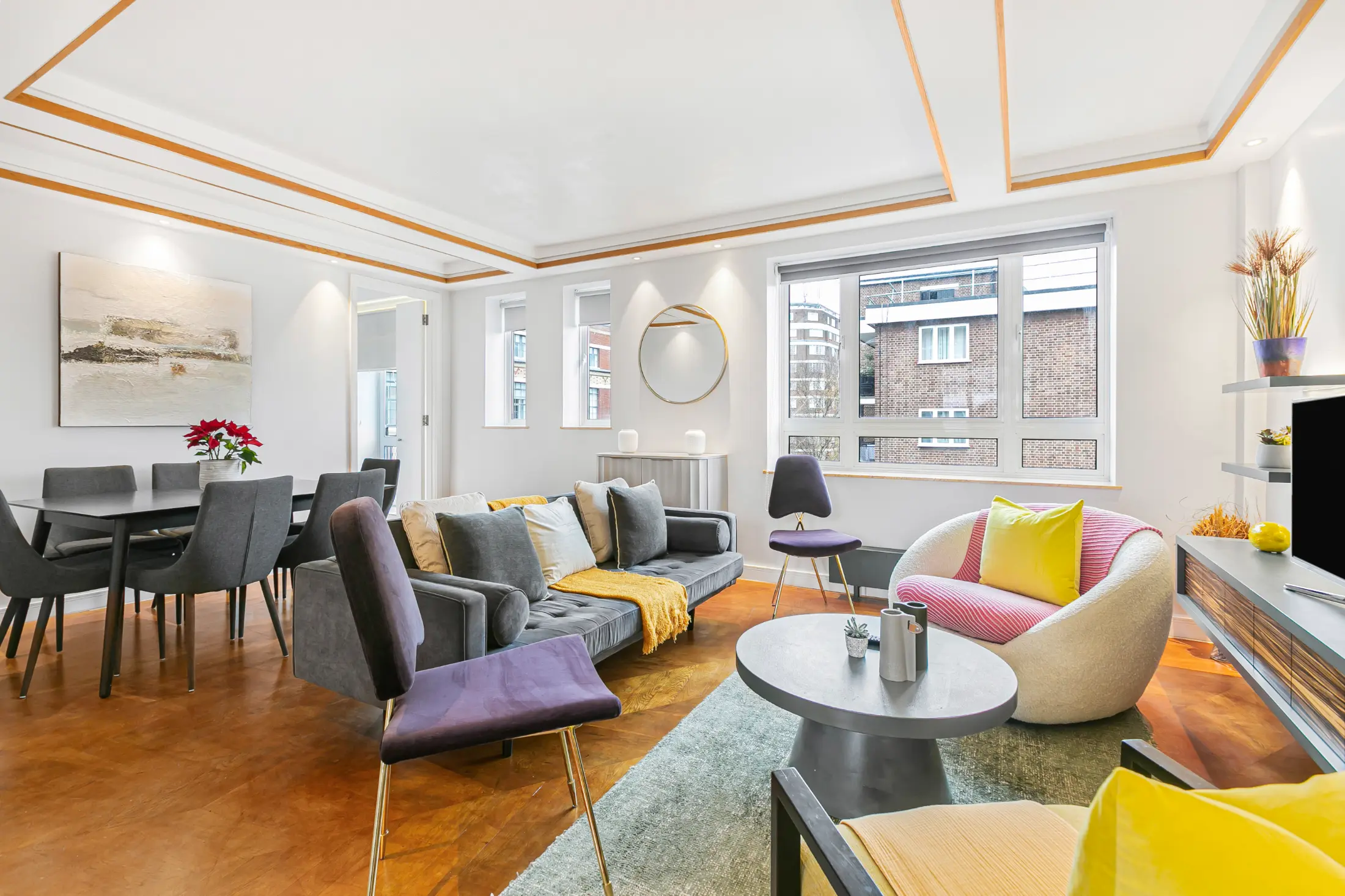 Fifth view of the spacious living area at Casa Cribs filled with natural light and modern furnishings.