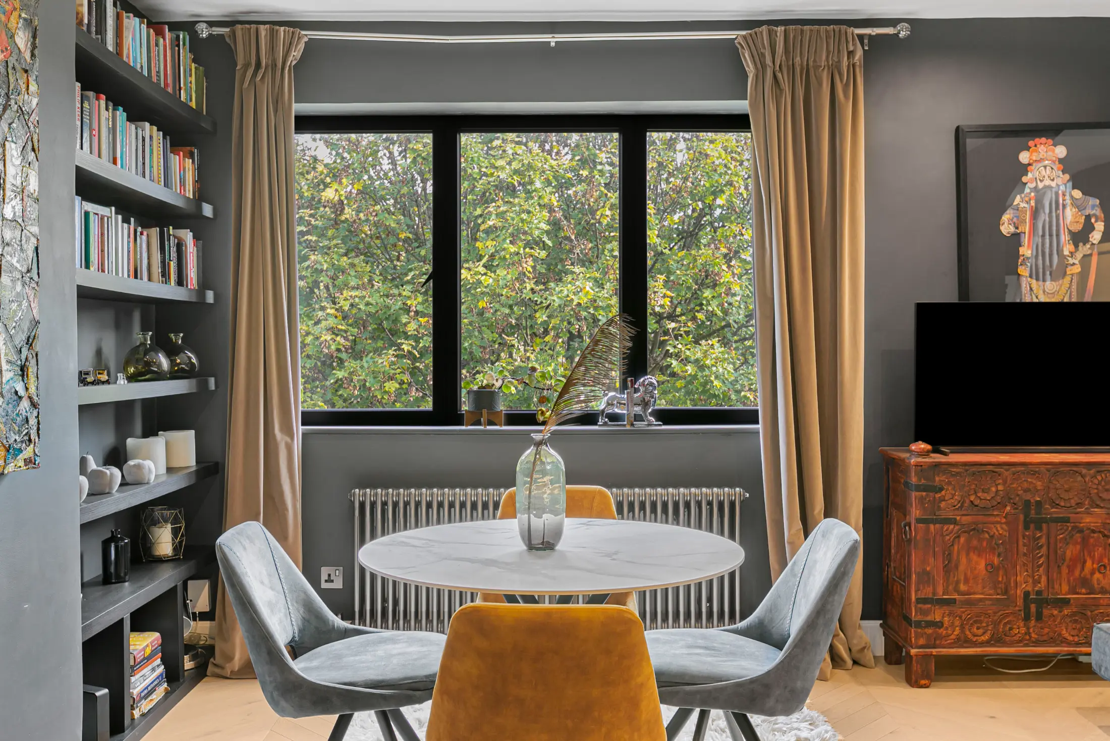 Fourth view of the modern dining space at Casa Cribs offering a welcoming atmosphere.