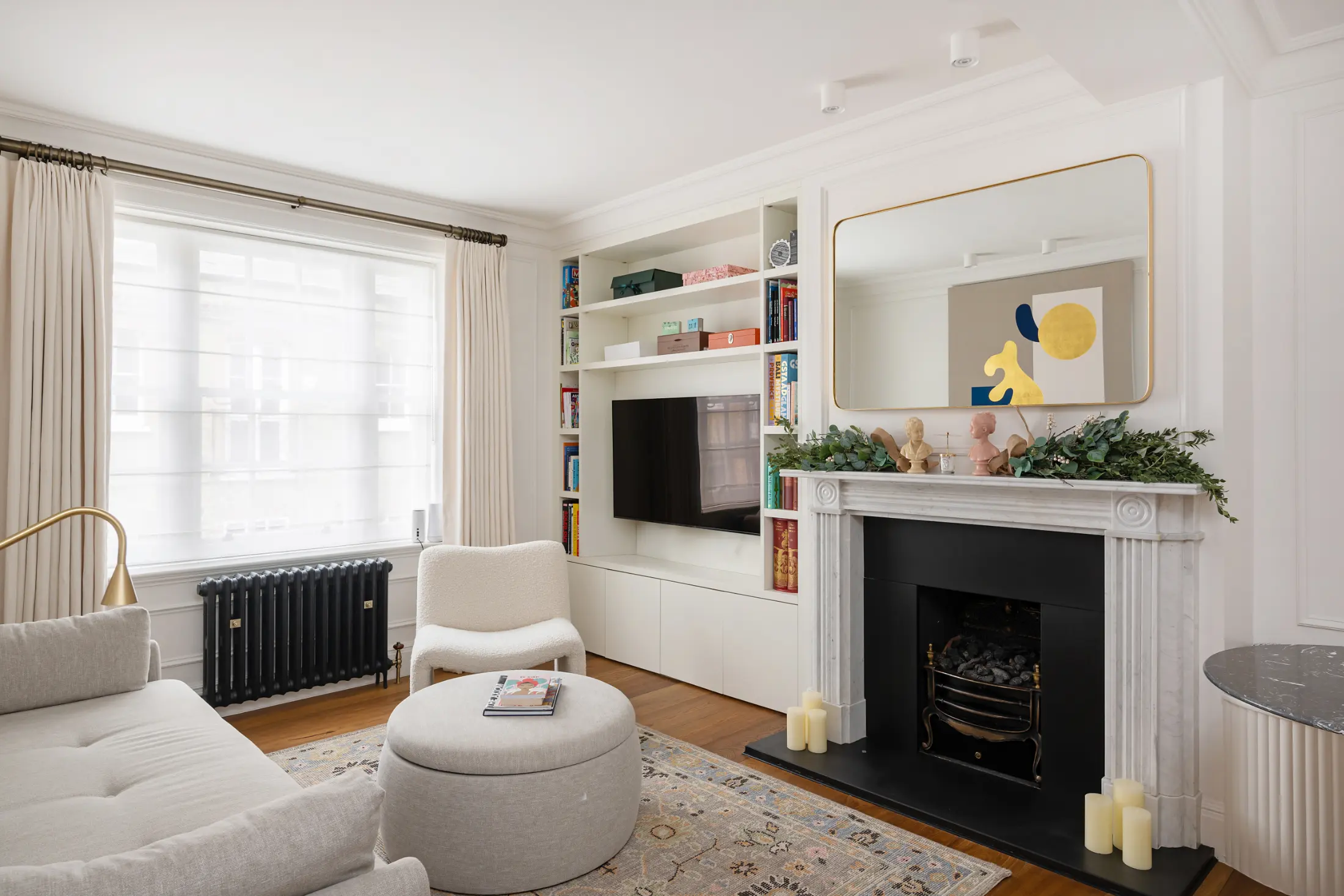 Another angle of the elegant fireplace at Casa Cribs providing a refined focal point.
