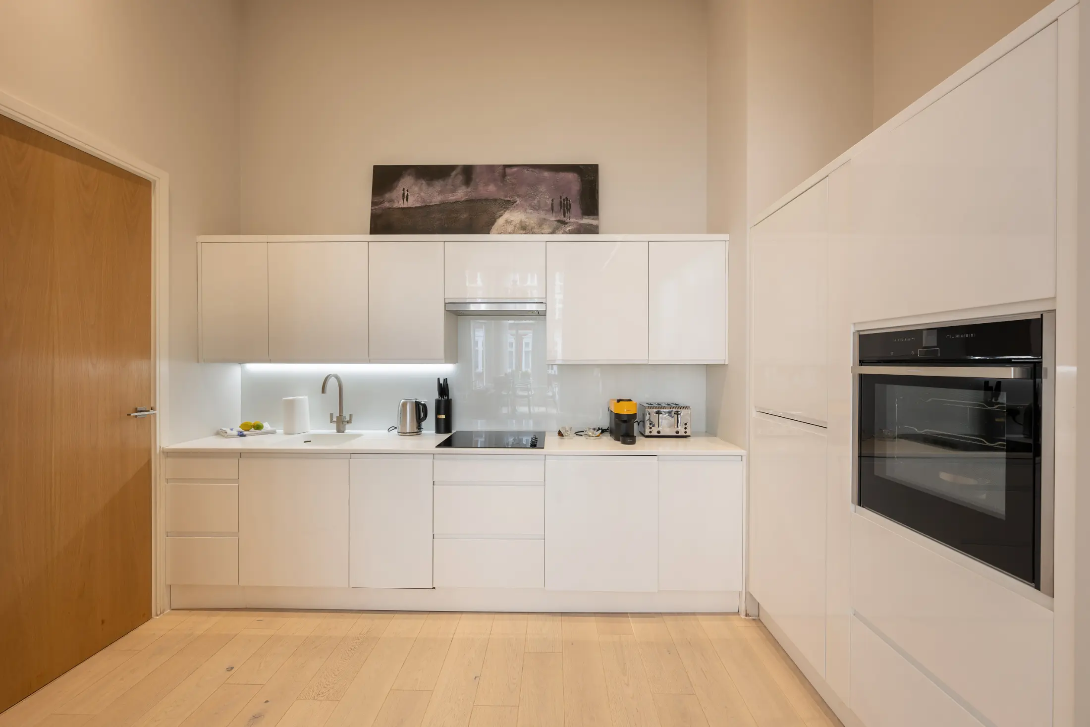 State-of-the-art kitchen at Casa Cribs with modern appliances and luxurious finishes.
