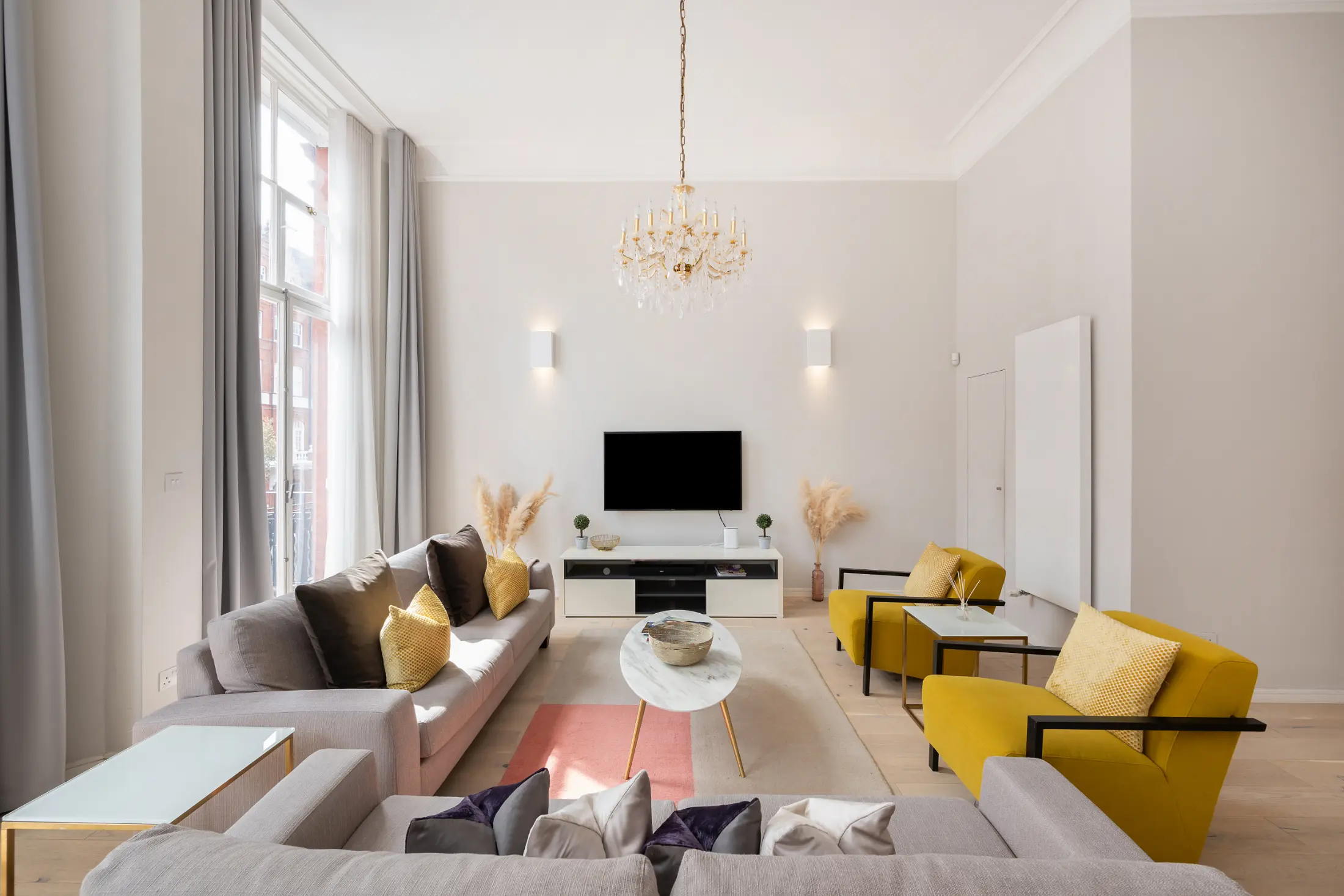 Third view of the bright and spacious open living area at Casa Cribs.