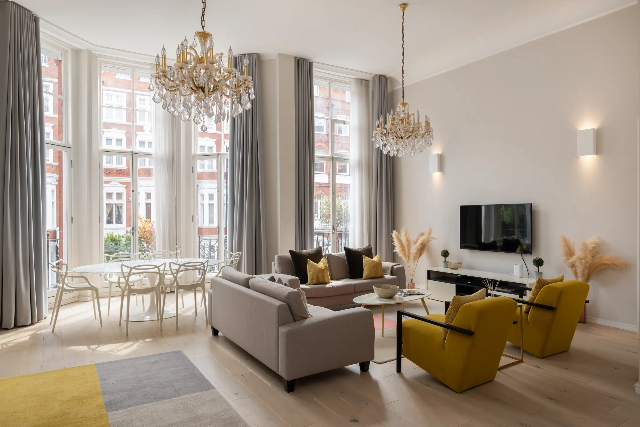 Another angle of the expansive living space at Casa Cribs capturing luxurious finishes and warm ambiance.