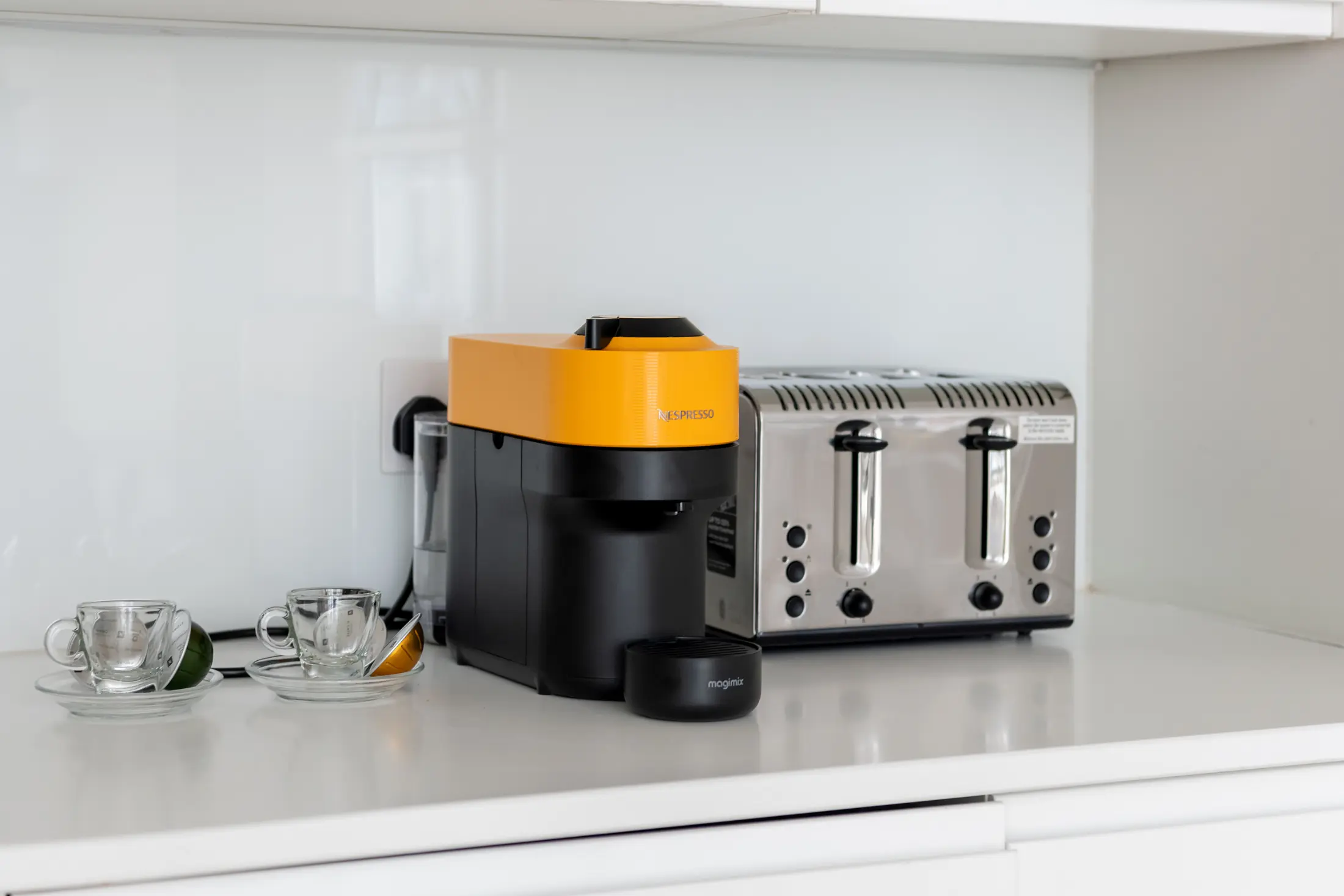Close-up of the modern kitchen appliances at Casa Cribs designed for gourmet cooking.