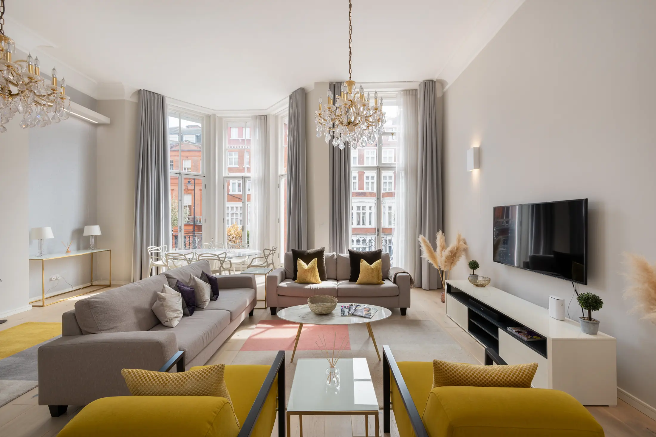 Seventh angle of the spacious and bright living area at Casa Cribs featuring elegant touches.
