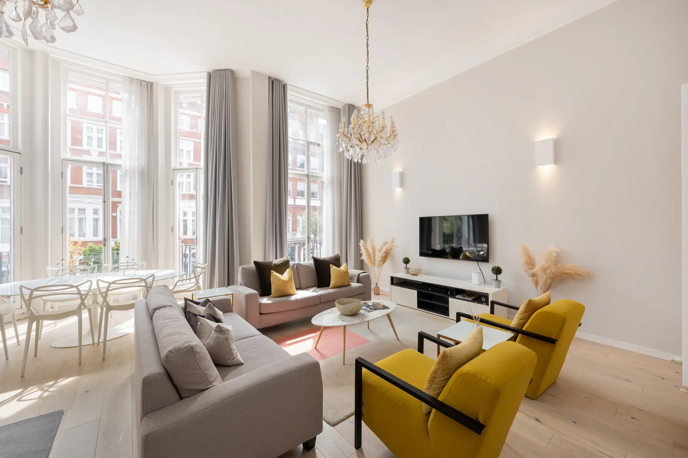 Sixth view of the grand living area at Casa Cribs blending classic charm and modern comfort.