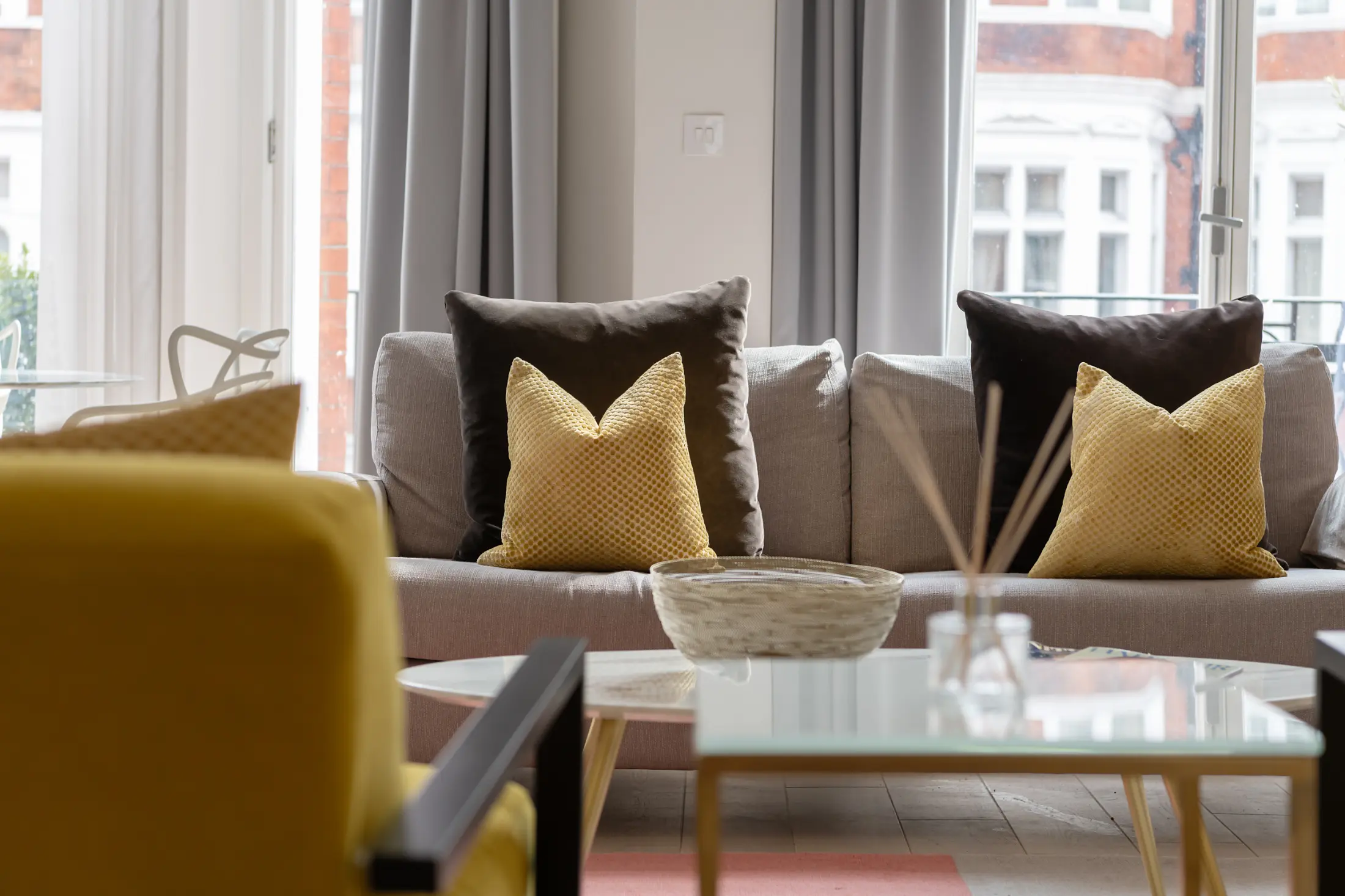 Plush sofa at Casa Cribs providing comfort and timeless elegance.