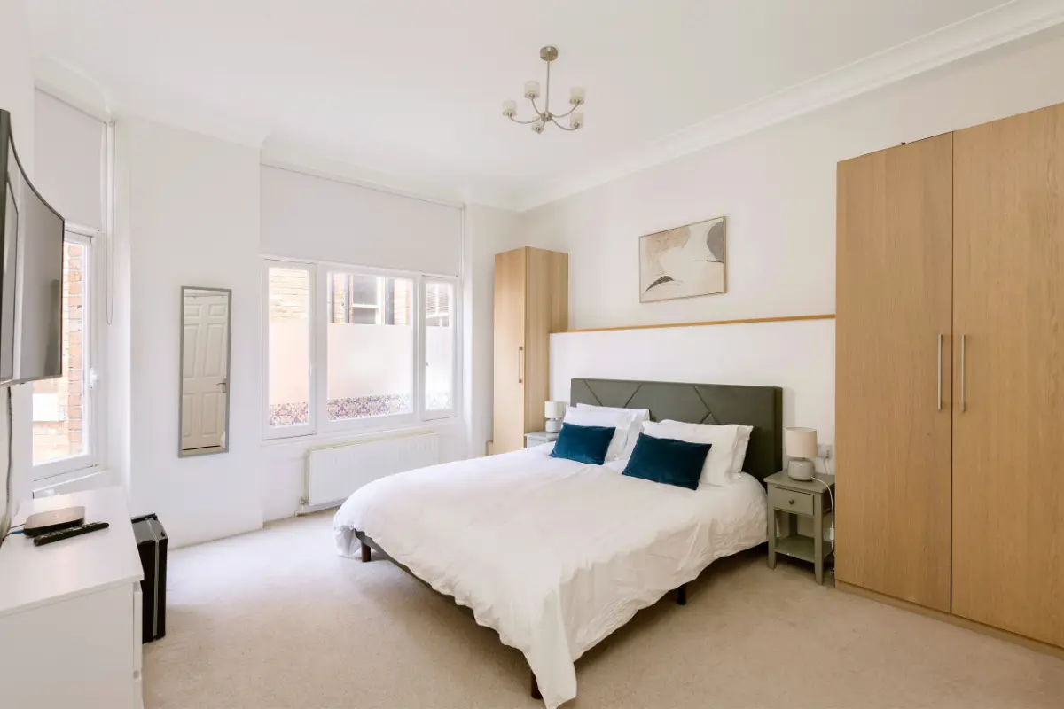 King-sized bedroom at Casa Cribs with premium bedding and refined decor.