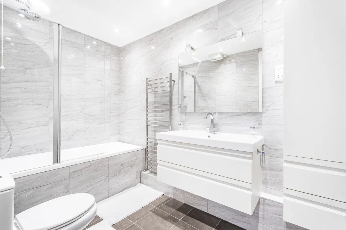 Modern bathroom at Casa Cribs featuring luxurious marble finishes and premium amenities.