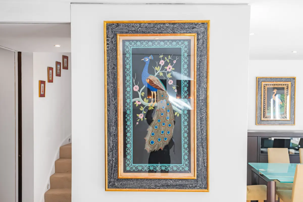 Artful wall decor at Casa Cribs adding a sophisticated touch to the living space.