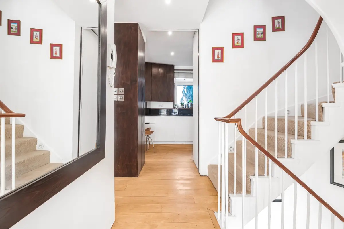 Stylish staircase at Casa Cribs adding architectural elegance to the space.