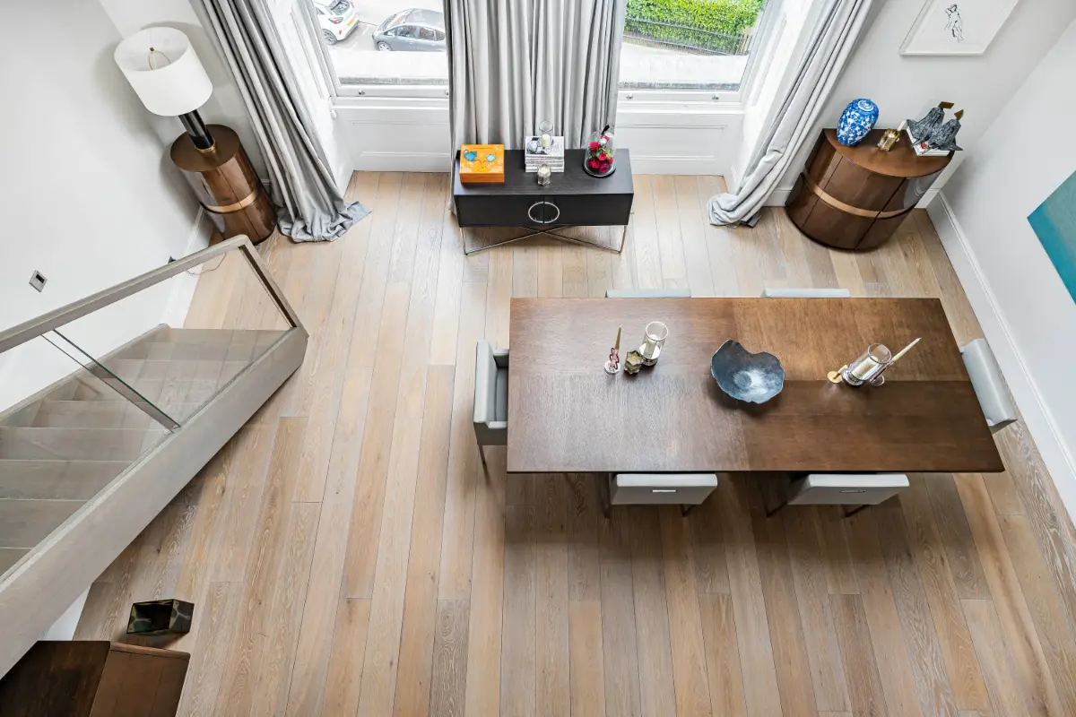 Overhead view of the elegant dining area at Casa Cribs with stylish lighting.