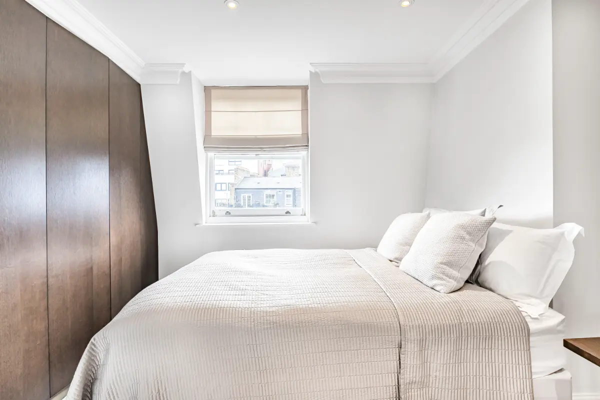 Second bedroom at Casa Cribs featuring refined decor and cozy comfort.
