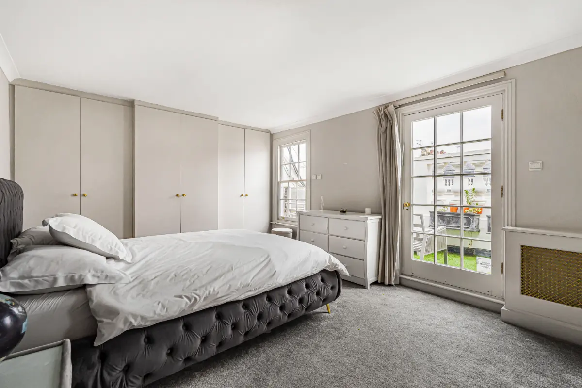Tranquil bedroom at Casa Cribs with plush bedding and elegant design.