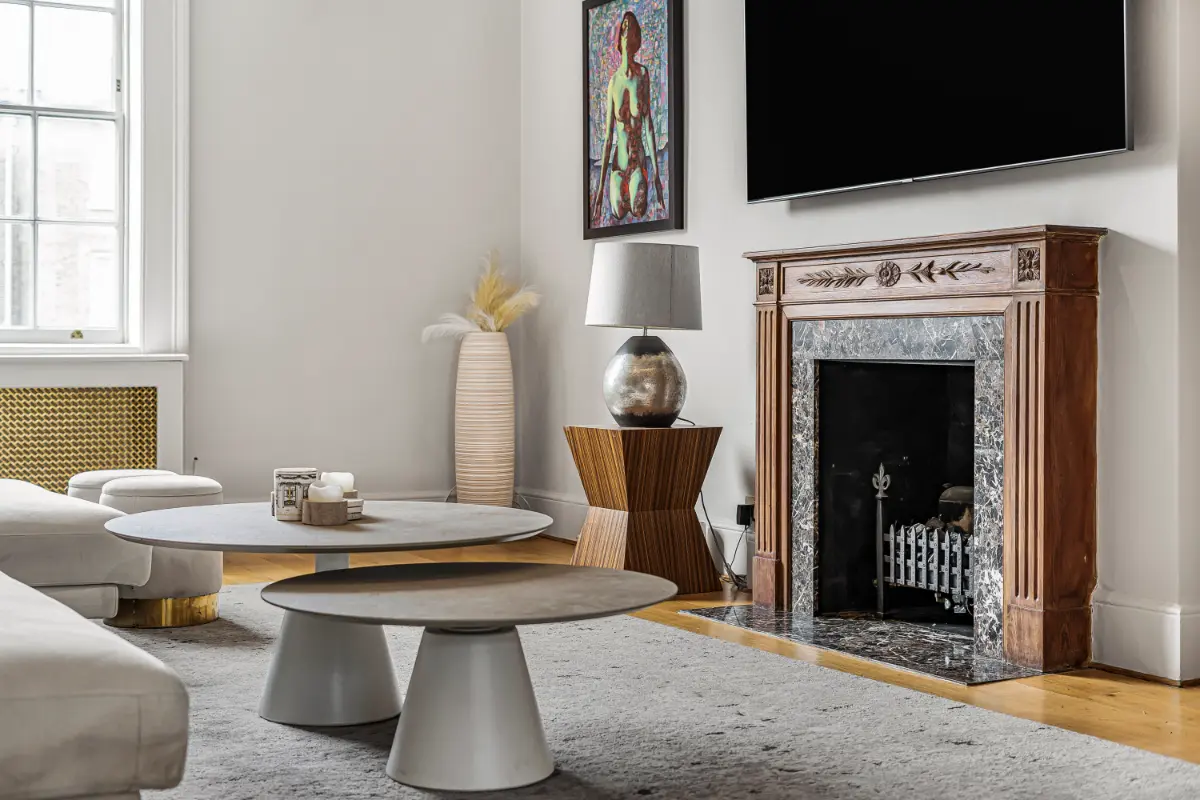 Elegant fireplace at Casa Cribs adding charm and warmth to the living area.