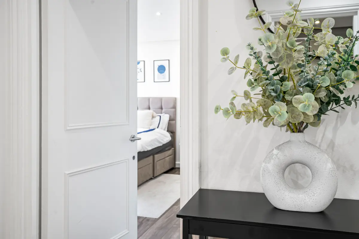	Decorative touch with a stylish vase and fresh flowers adding elegance to Casa Cribs.