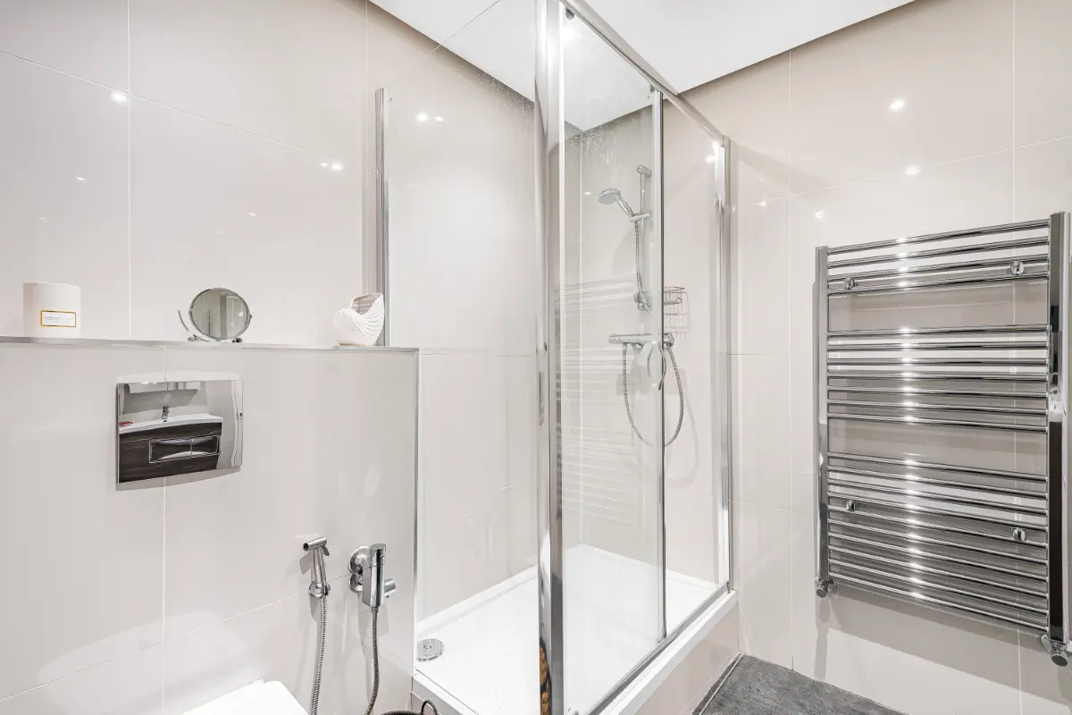 	Bright and sleek bathroom at Casa Cribs offering comfort and style.