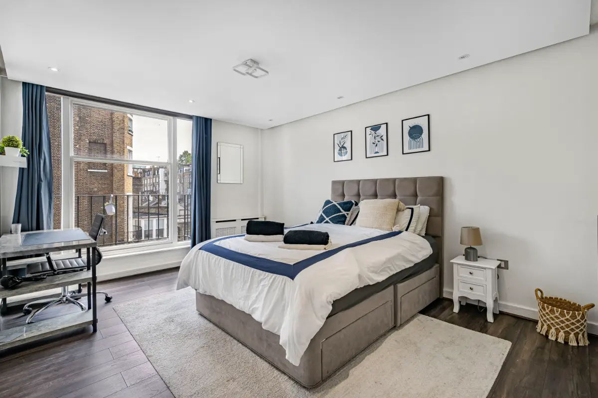 Serene bedroom at Casa Cribs with a plush bed and tasteful decor.