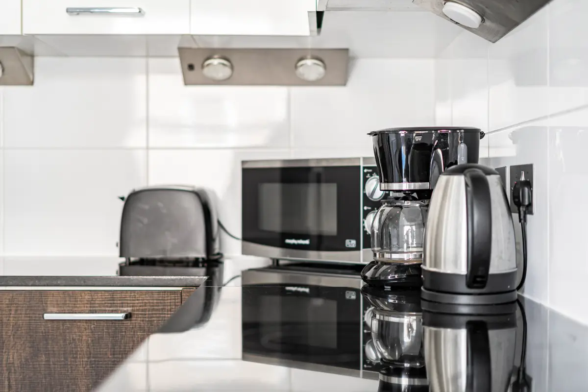 	Another view of the well-appointed kitchen appliances at Casa Cribs, ideal for culinary creativity.