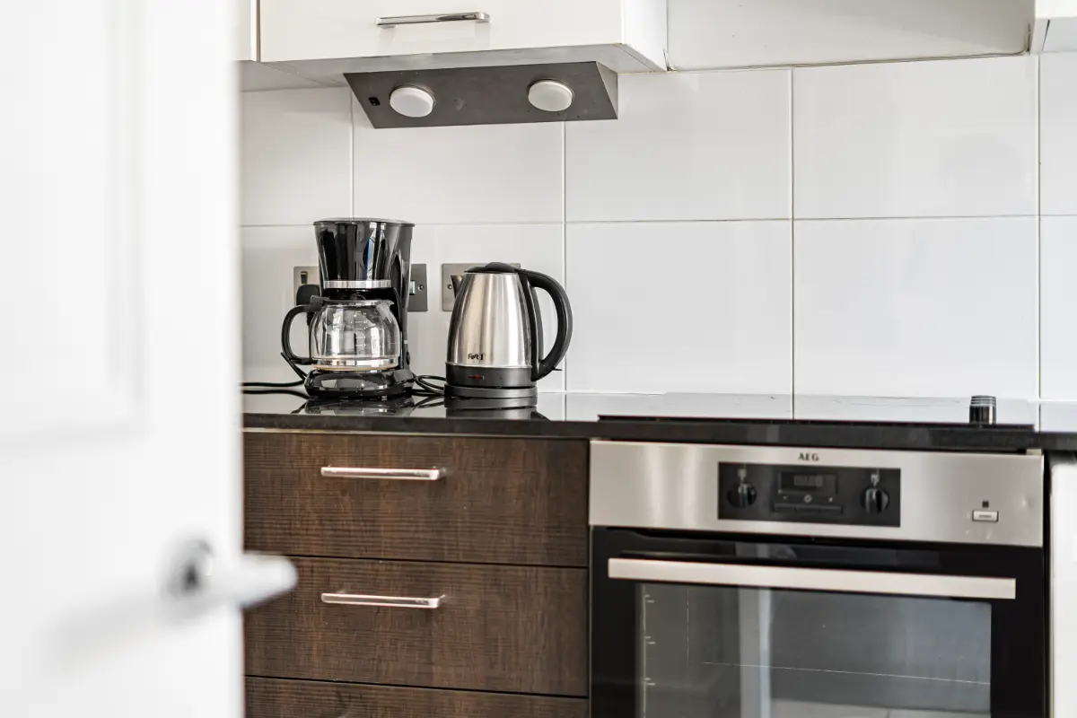Close-up of premium kitchen appliances at Casa Cribs ensuring effortless cooking.