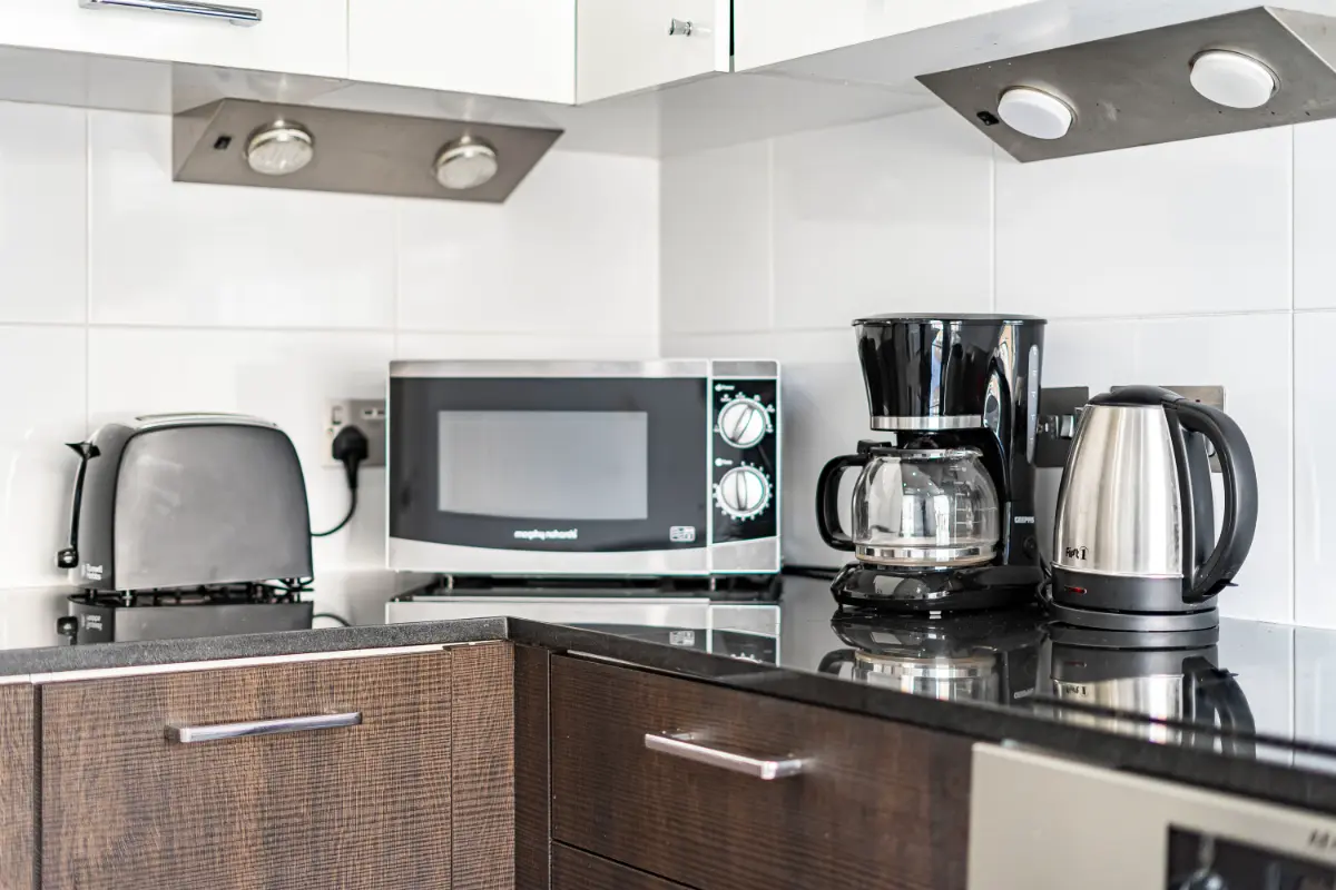 	Detail shot of stainless steel kitchen equipment at Casa Cribs ready for gourmet meals.