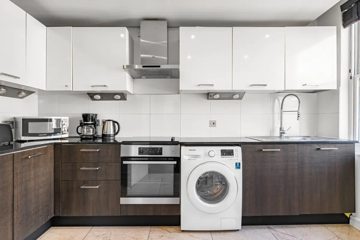 	Fully equipped kitchen at Casa Cribs with chef-grade appliances and sleek finishes.