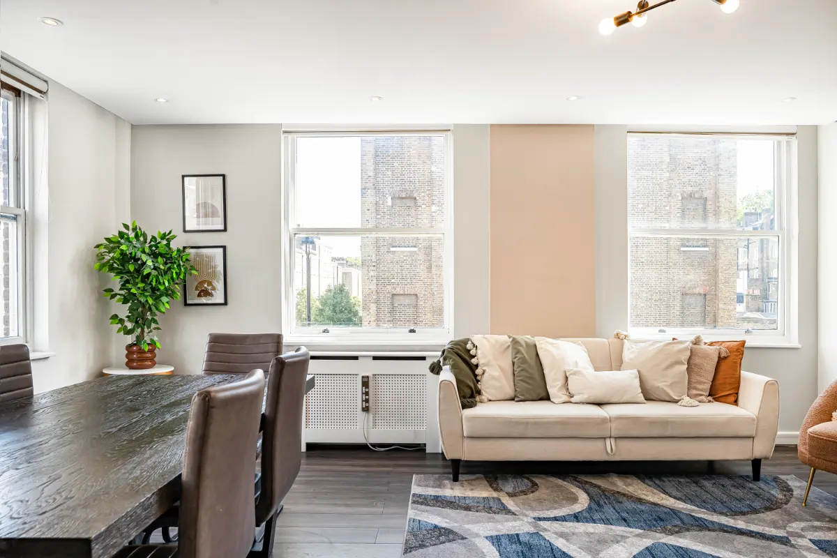 	Spacious living room at Casa Cribs with elegant furnishings and a cozy ambiance.