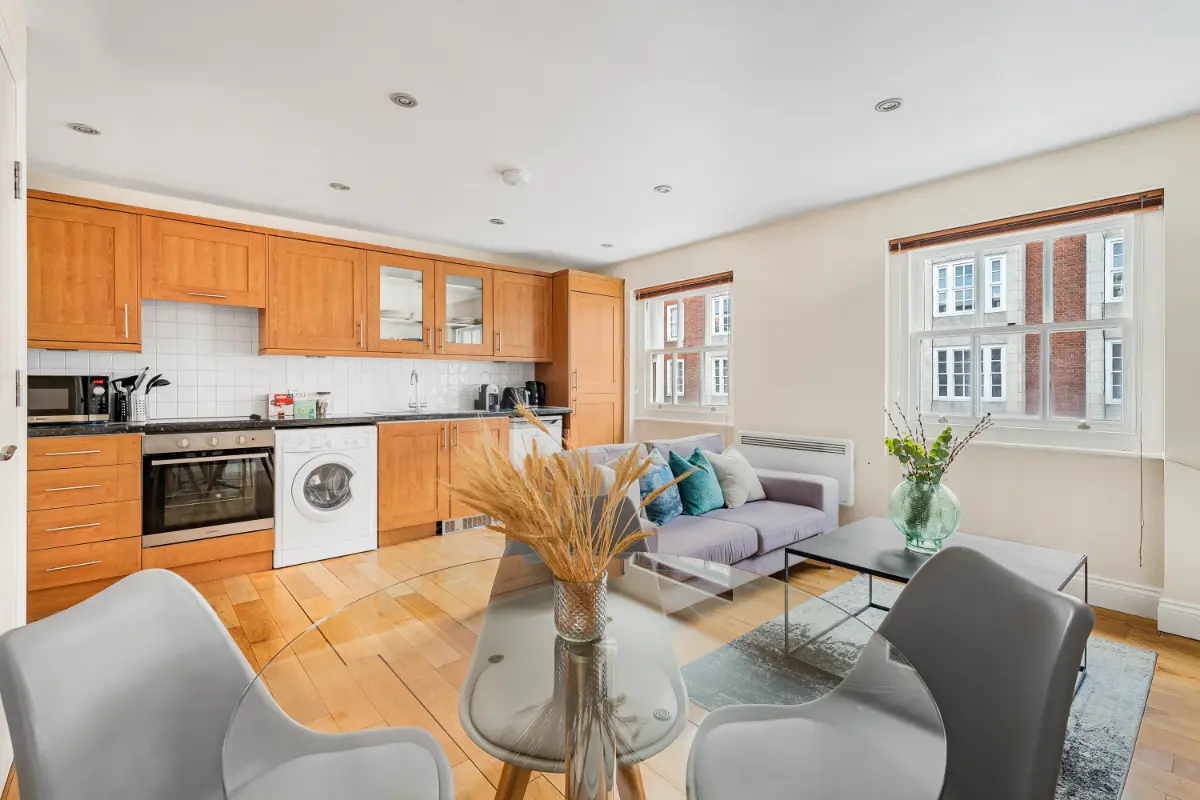 Modern fully equipped kitchen at Casa Cribs with integrated appliances and a dining nook