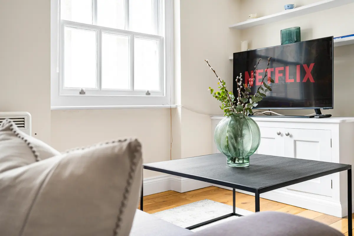 Close-up of the comfortable sofa and smart TV at Casa Cribs.