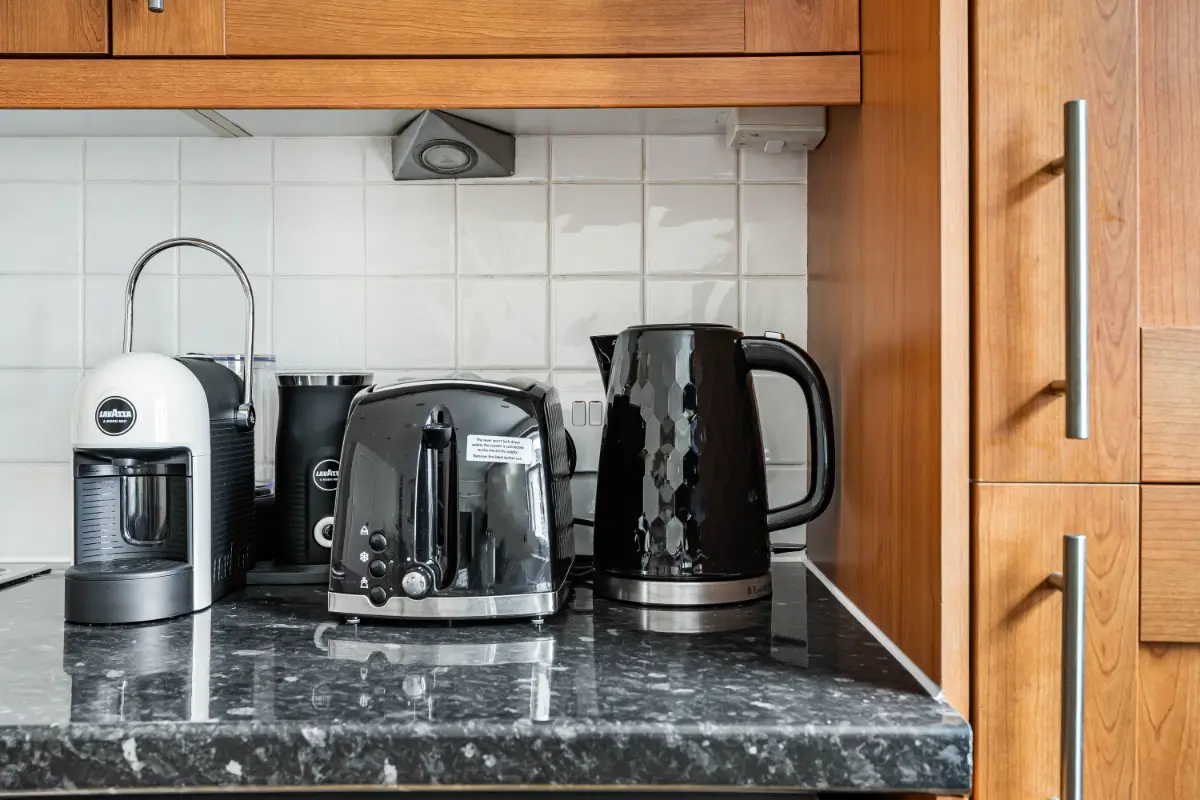 Modern kitchen equipment and amenities at Casa Cribs.