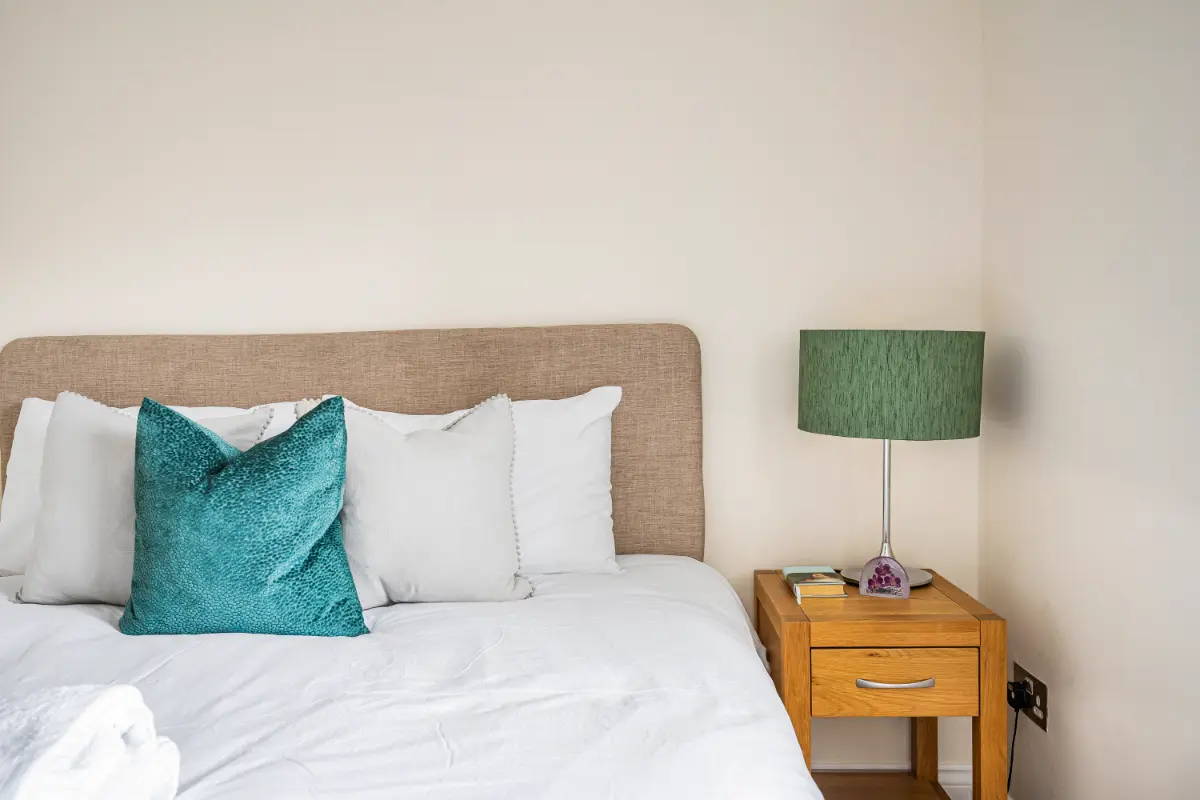Close-up of the comfortable bed with soft linens at Casa Cribs.