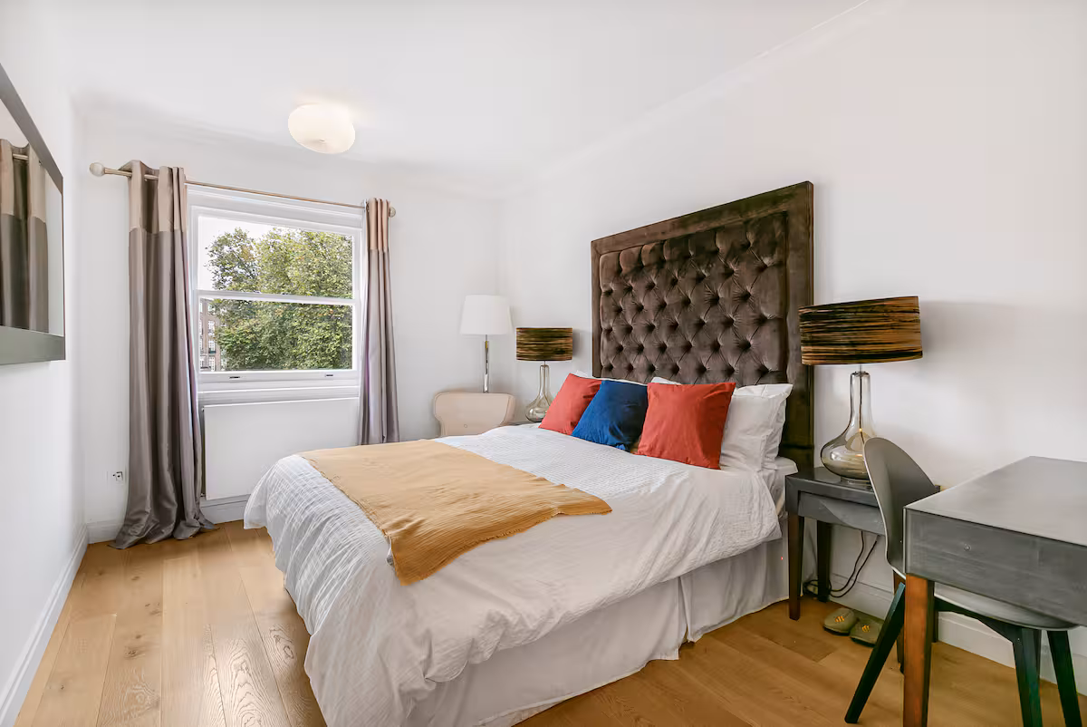 Elegant bedroom at Casa Cribs with plush bedding and refined decor.