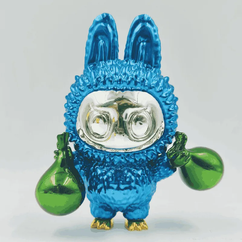 Shiny blue bunny-like figurine with silver face holding green shiny bags in both hands.