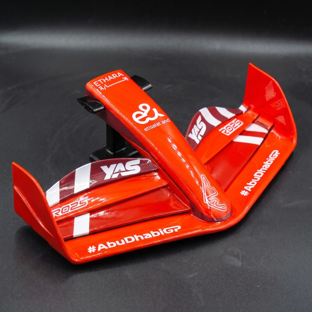 Race car nose cone in a flawless high-gloss red finish.
