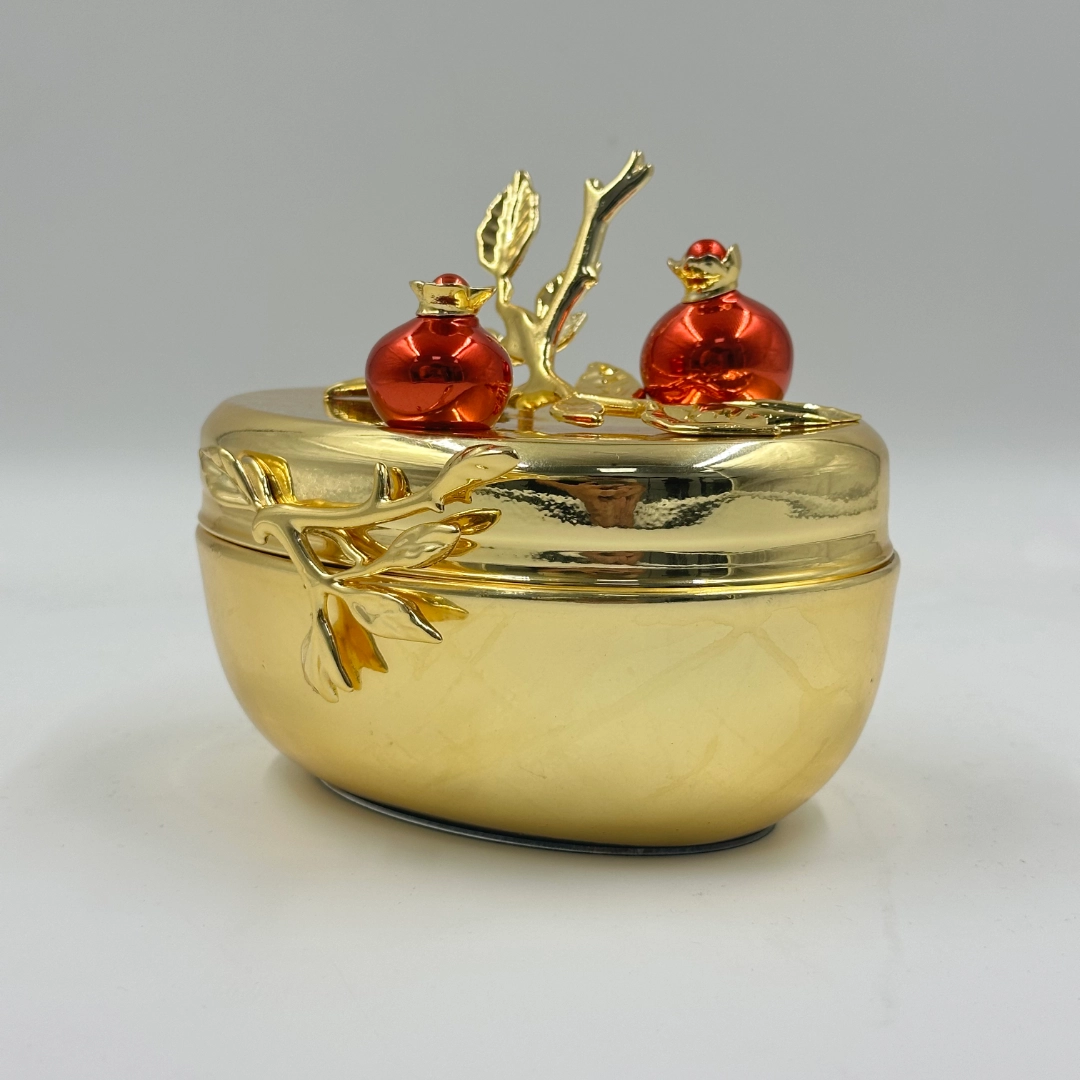 Detail of an intricate gold decorative piece.