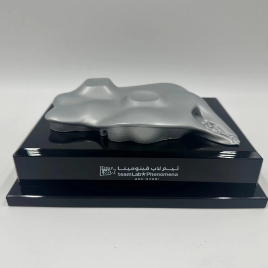 Abstract silver sculptural model on display