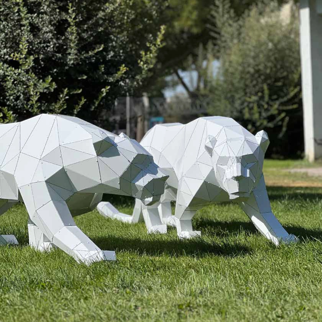 Smooth white animal sculpture produced from a digital sculpt.