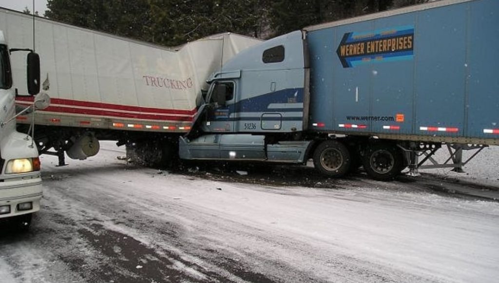 Jackknife truck crash on the road