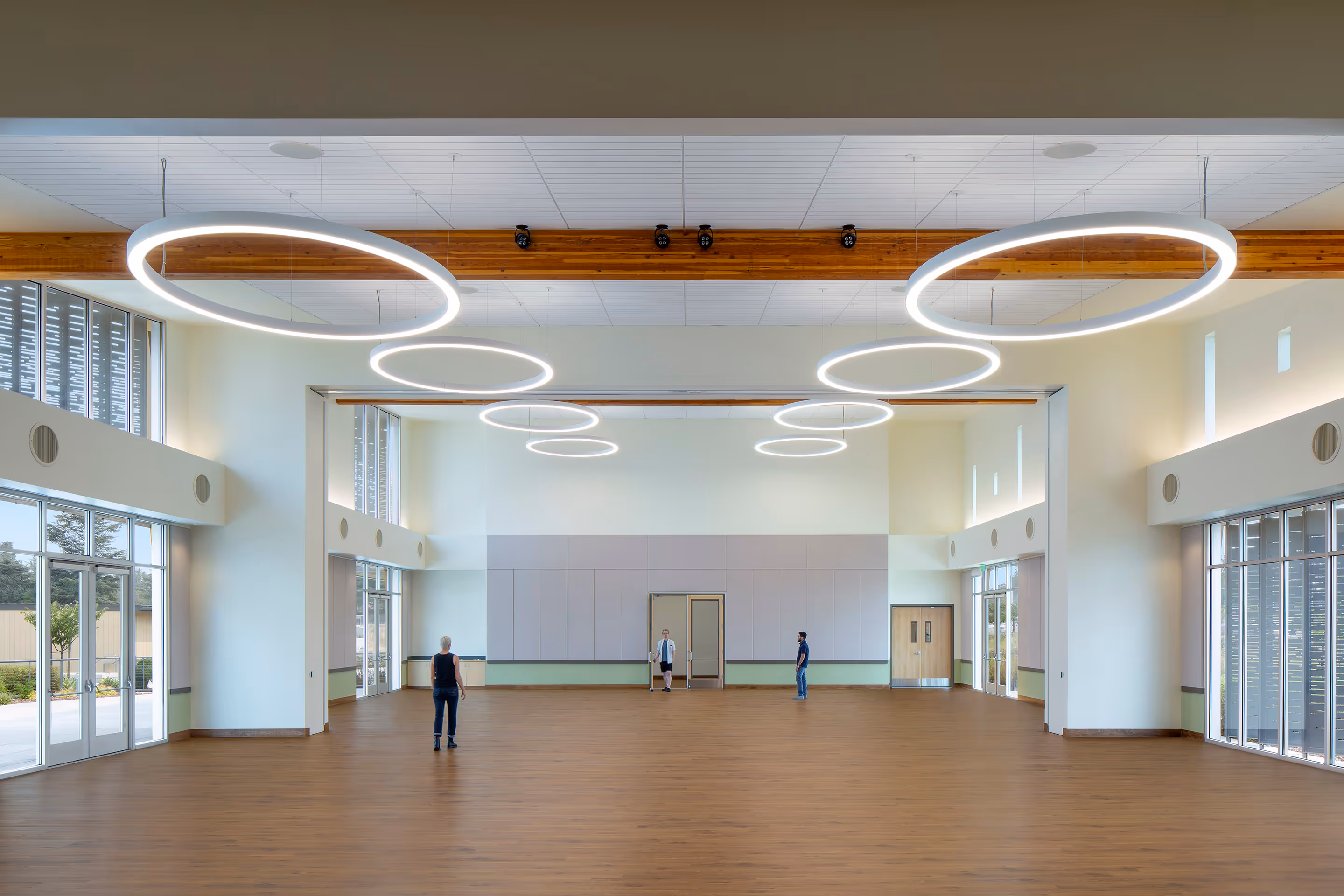 Oakley Community Center interior common areas designed for community gatherings, meetings, and social interaction spaces