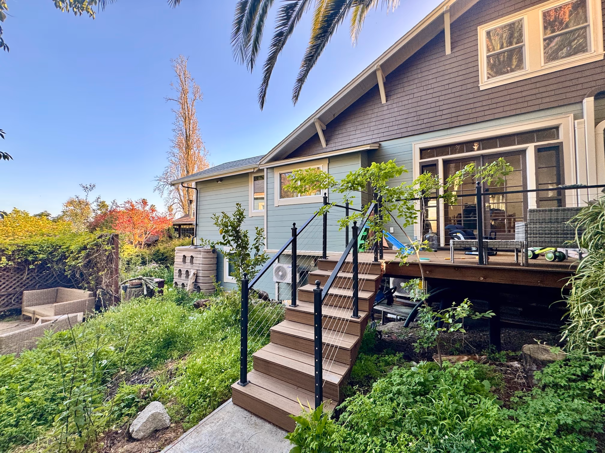 Canticle Farm urban village design with removed fences creating unified shared garden landscape for communal living