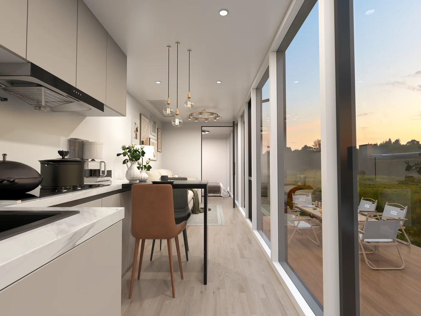Kitchen counter, cabinetry and pendant lighting inside a Dakeeta unit