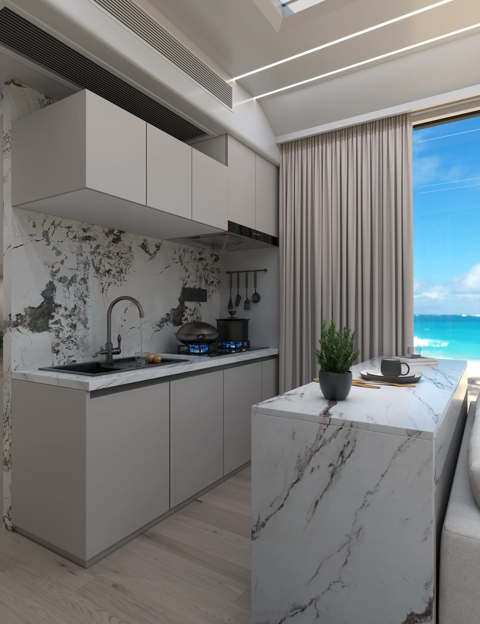 The Lockhart 420 kitchen counter, gas hob and sink set against marble with the sea beyond