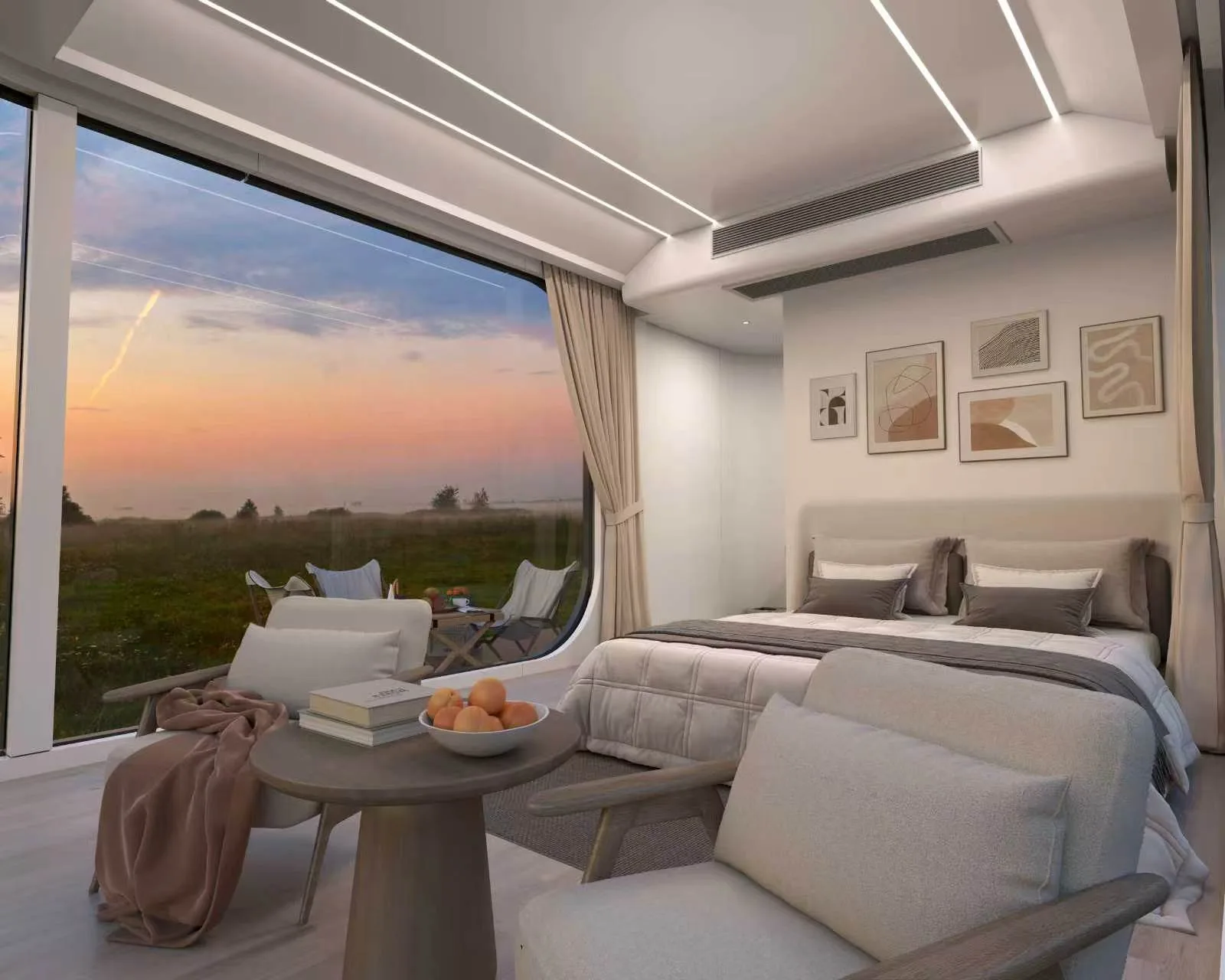 The Marfa 200 at dusk, bed and lounge seating under the curved ceiling