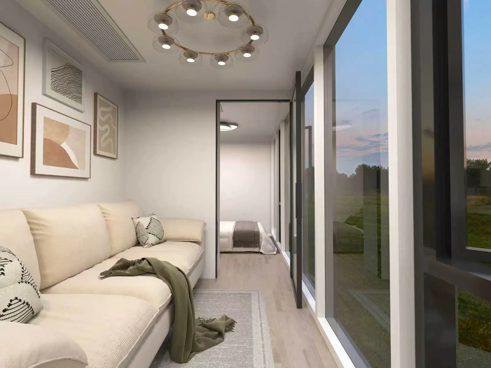 The Austin 280 living end, sofa and framed prints with the corridor running past