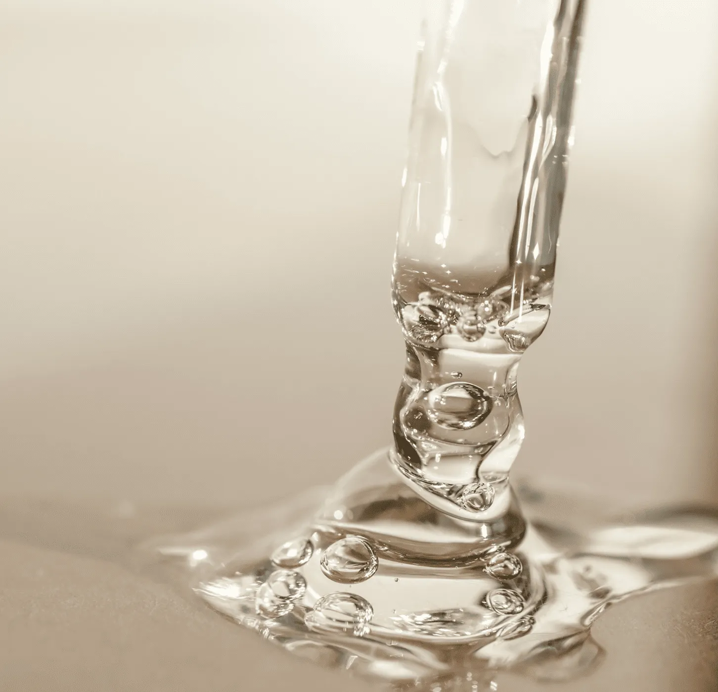 Water droplets splashing and creating intricate liquid patterns