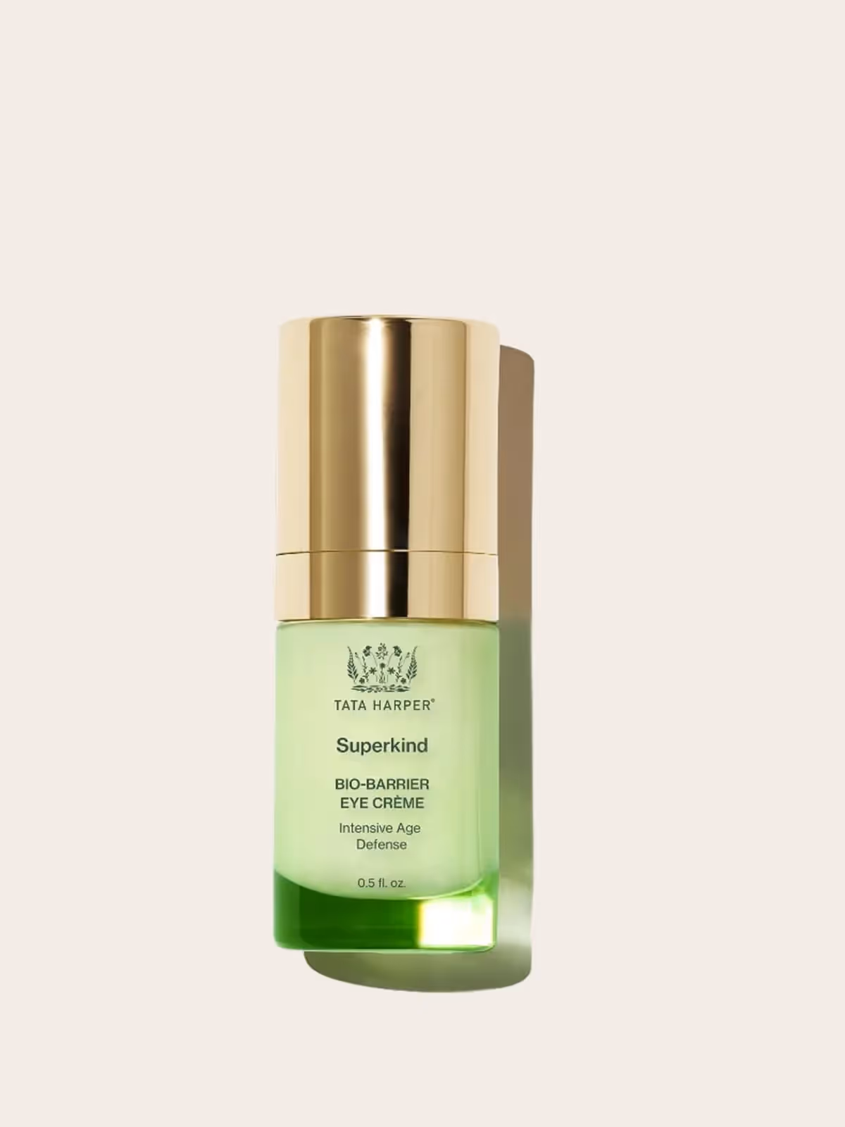 Tata Harper Superkind Bio-Barrier Eye Crème in green and gold bottle