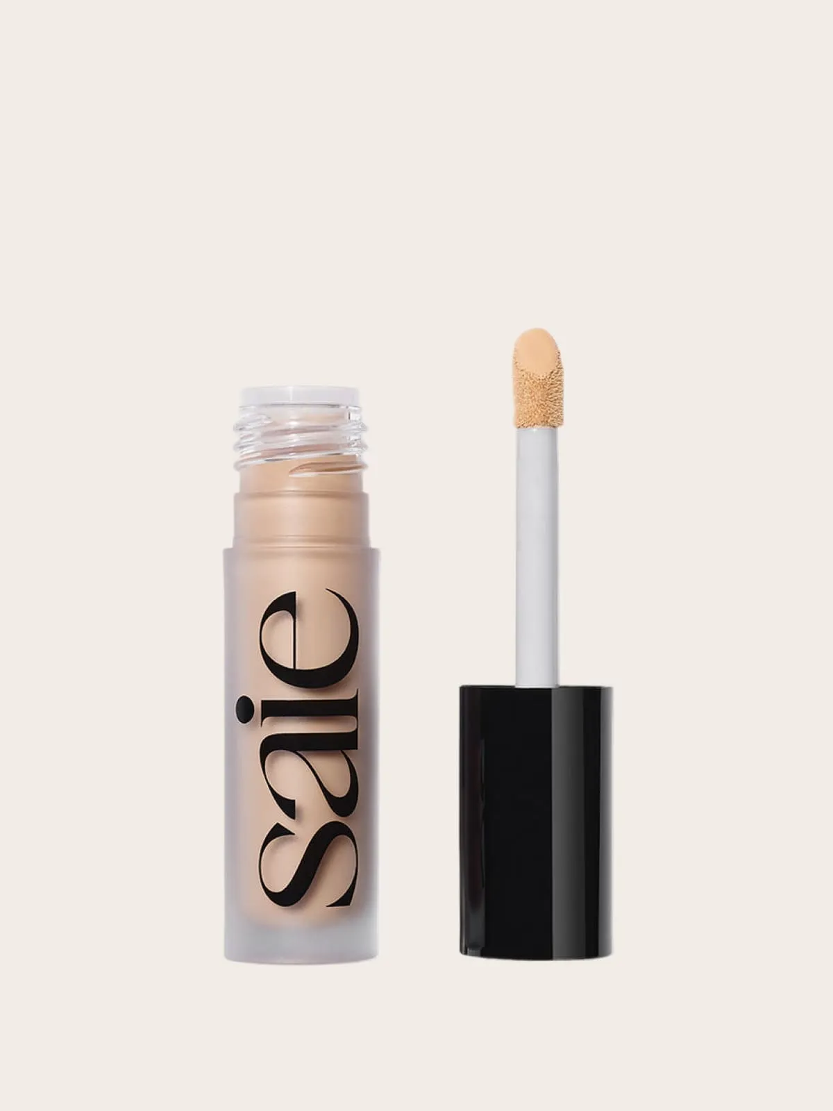 Saie makeup liquid concealer in beige with applicator wand