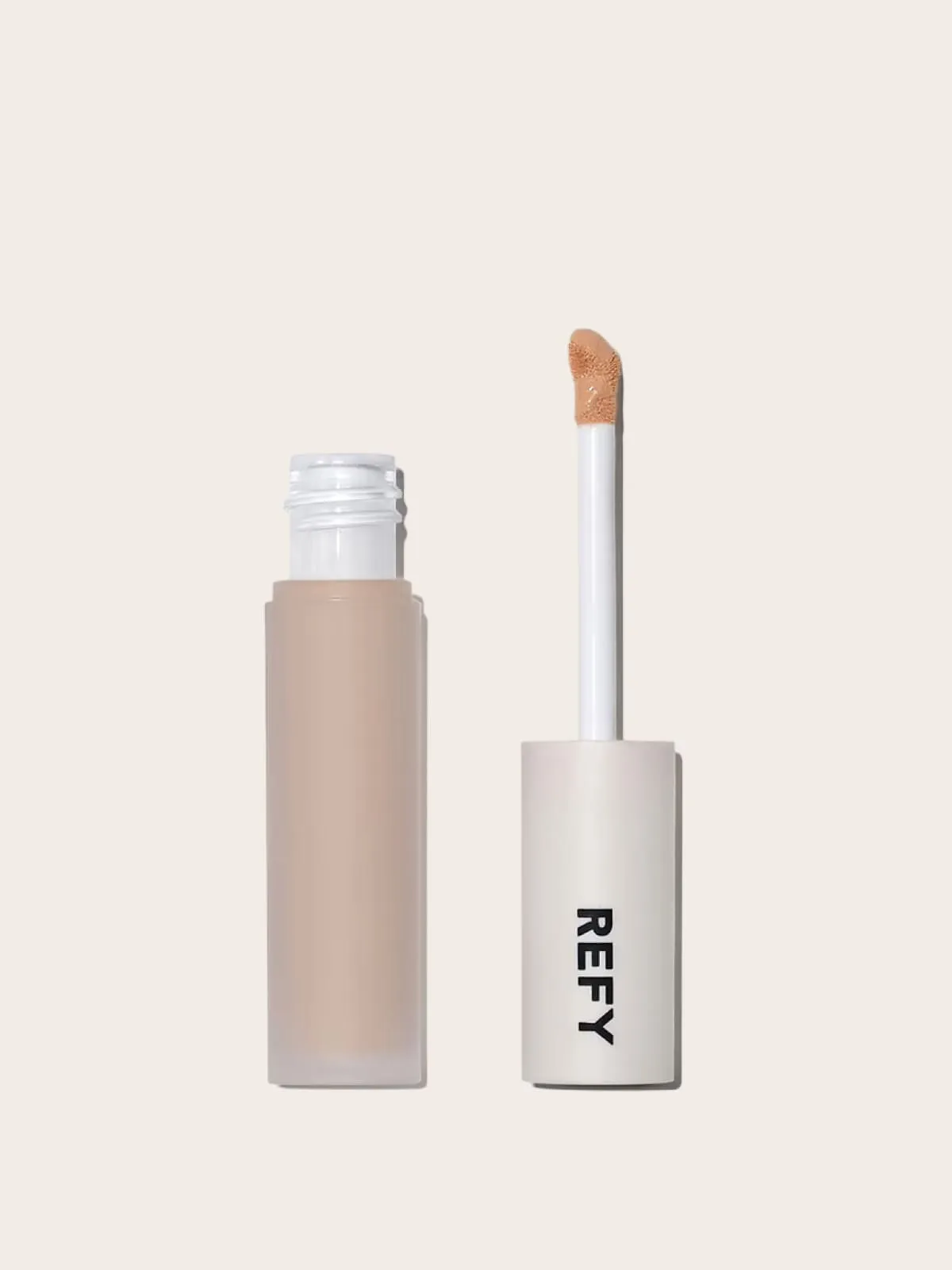 REFY makeup concealer with applicator on white background